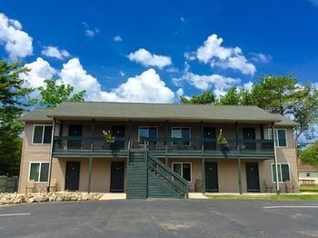 Lucky Horseshoe Cabins Hotel Au Sable Buitenkant foto