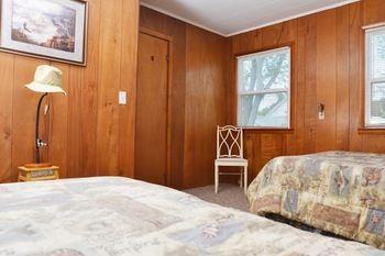 Lucky Horseshoe Cabins Hotel Au Sable Buitenkant foto